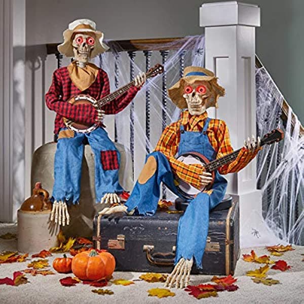 Tongtai Halloween Decor Co. - Esqueletos animados con luz LED y sonido que tocan el banjo, juego de 2 unidades