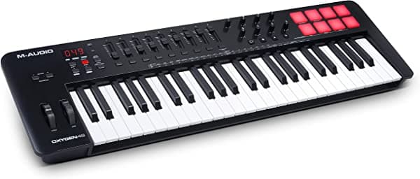 M-Audio Oxygen 49 (MKV) - Teclado controlador MIDI USB de 49 teclas con pads de percusión, modos de acordes y escalas inteligentes, arpegiador y suite de software incluida, negro