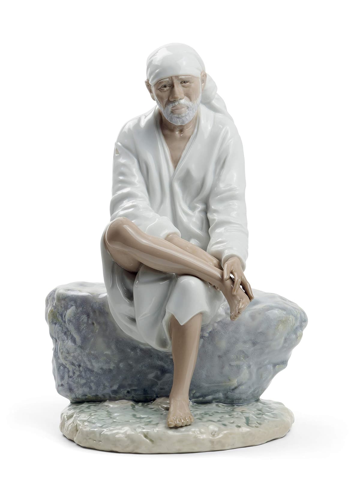 LLADRO: Figura de Sai Baba hindú en porcelana brillante. Figura decorativa de hombre indio en porcelana. 01008707